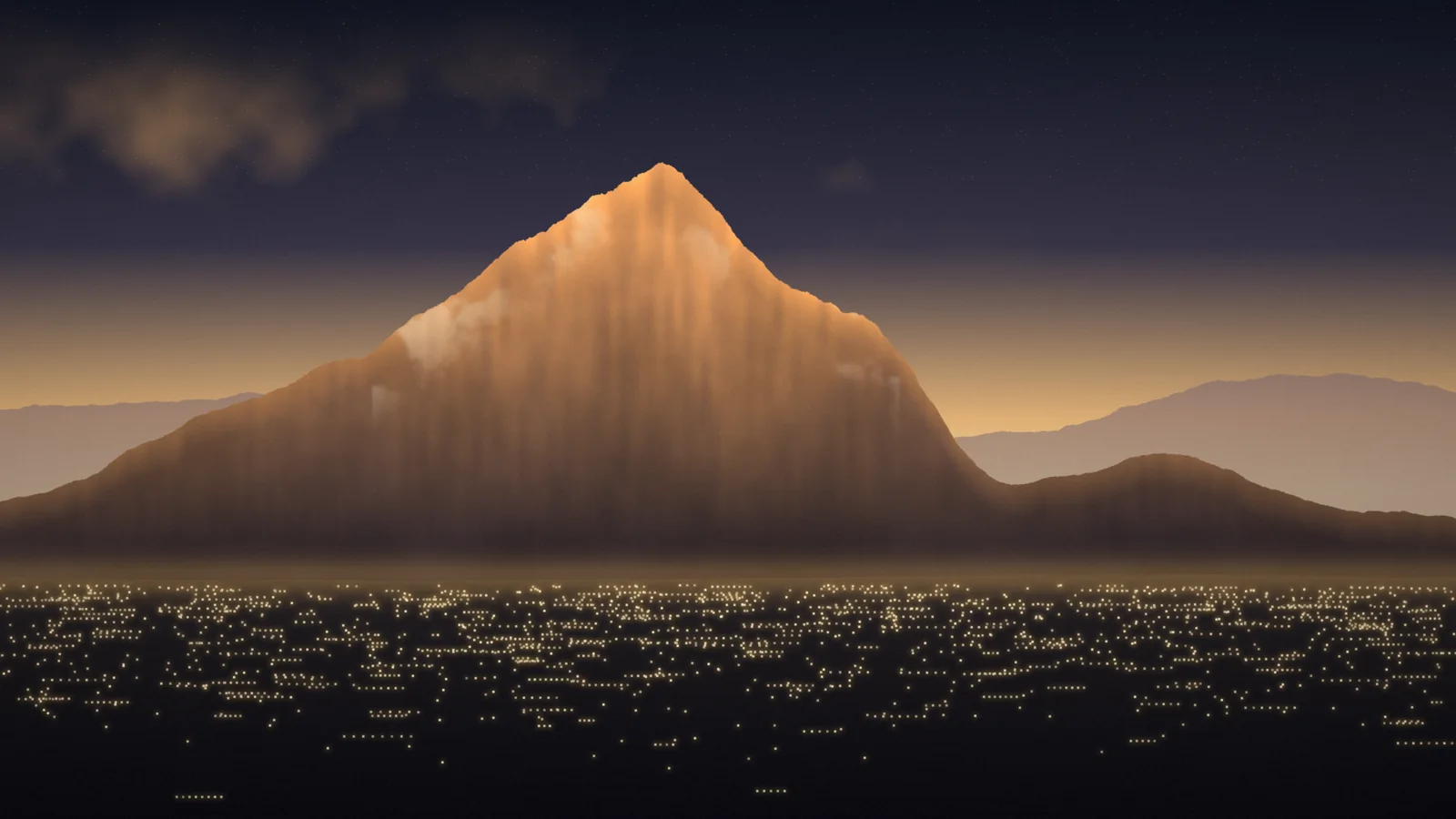 Mount Timpanogos above Orem at golden hour, with warm valley lights below the mountain